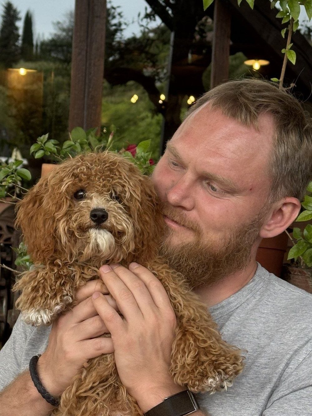 Ilia Sotonin with a dog
